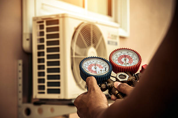 Professional Hvac technician working in Wilson, OK